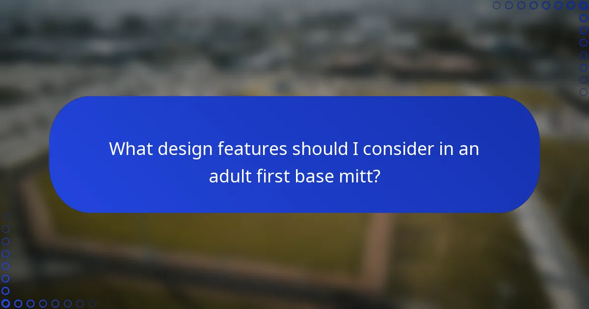 What design features should I consider in an adult first base mitt?